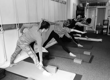 Group of people doing yoga